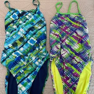 Two women’s speedo swim suits